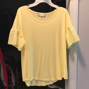Small yellow shirt with designed sleeves